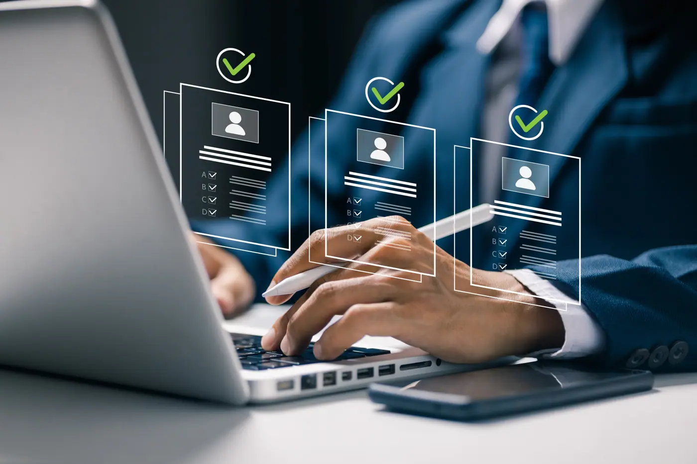 Recruiter reviewing verified candidate profiles on a laptop